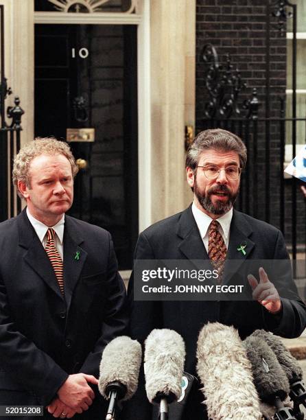 Sinn Fein leader Gerry Adams and chief negotiator Martin McGuinness talk to newsmen after leaving 10 Downing Street 27 April following talks with...