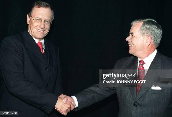 Daimler-Benz chairman Juergen Schrempp (left) and Daimler-Benz chairman Juergen Schrempp (left) and
