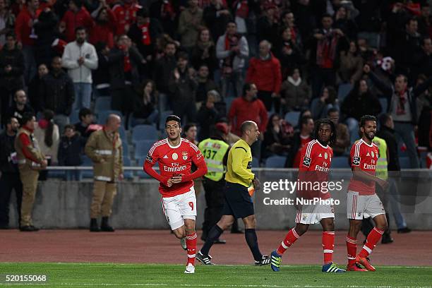 Benfica's Mexican forward Raúl Jiménez celebrates after scoring a goal during the Premier League match between Academica and SL Benfica, at Municipal...