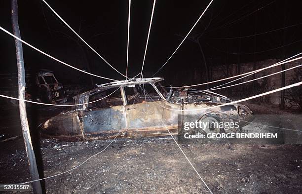 View dated 12 July 1978 of a burnt out French car and tent of "Los Alfaques" campsite devastated at 03 pm 11 July 1978 by a propane gas explosion...