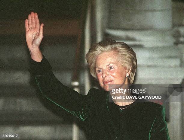 The Duchess of Kent waves to the media after being received into the Roman Catholic church by the Archbishop of Westminster, cardinal Hume at the...