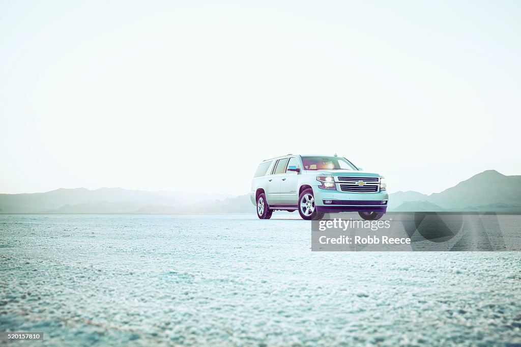 Chevrolet Suburban at sunset at Bonneville Salt Flats, Utah