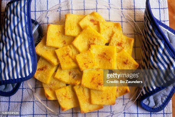 baked polenta squares - bo zaunders stock pictures, royalty-free photos & images