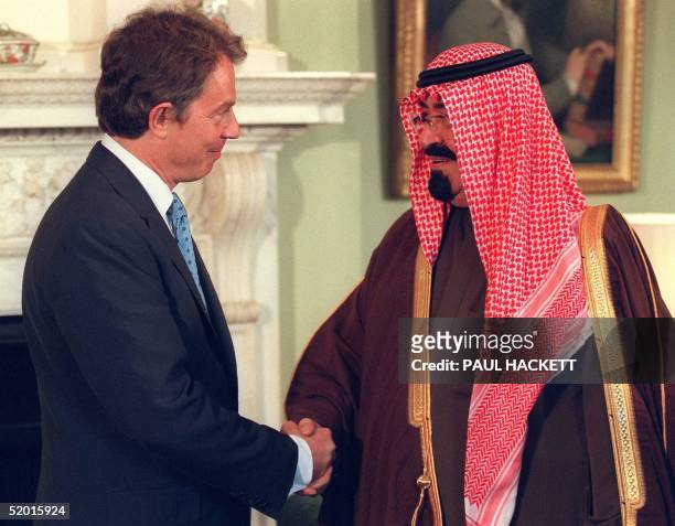 Prince Abdullah Bin Abdul Aziz Al Saud of Saudi Arabia shakes hands with British Prime Minister Tony Blair at Downing Street 15 September. The Crown...