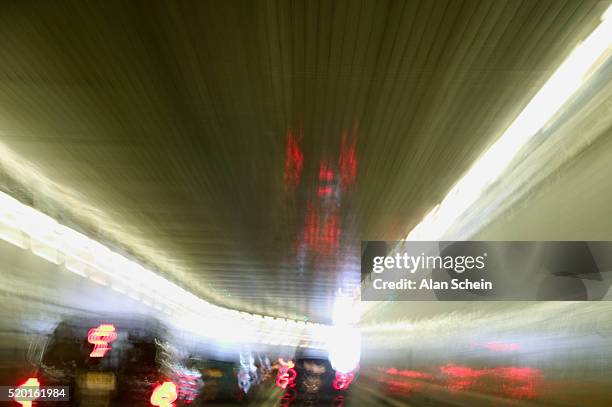 blurred cars in lincoln tunnel - lincoln tunnel stockfoto's en -beelden