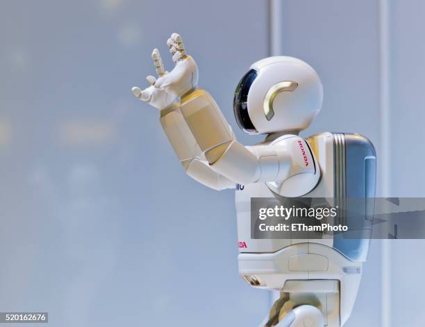 honda robot asimo - asimo robot stock pictures, royalty-free photos & images