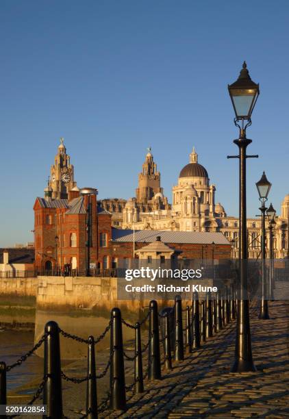 riverside walk at albert dock in liverpool - albert dock stock pictures, royalty-free photos & images