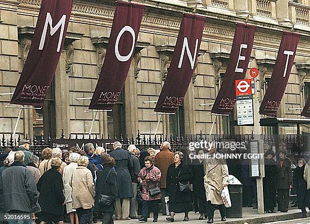 Crowds eager to see 80 of Claude Monet's important works continue to snake across the courtyard and into Piccadilly 22 January in London, as they...