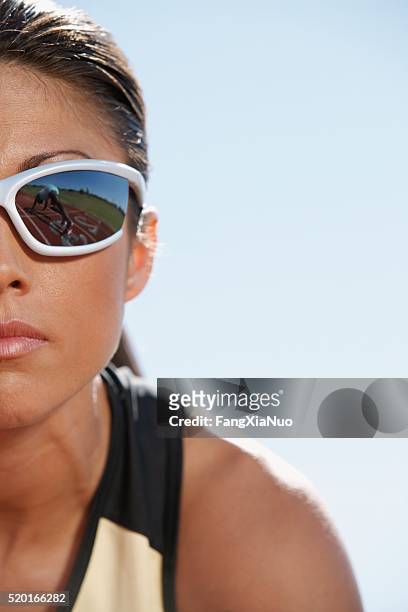 track and field athlete with sunglasses - forward athlete stock pictures, royalty-free photos & images