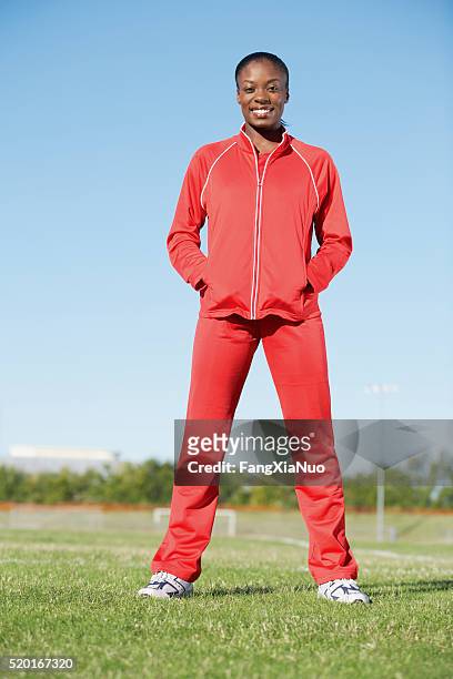 track and field athlete - tracksuit stock pictures, royalty-free photos & images