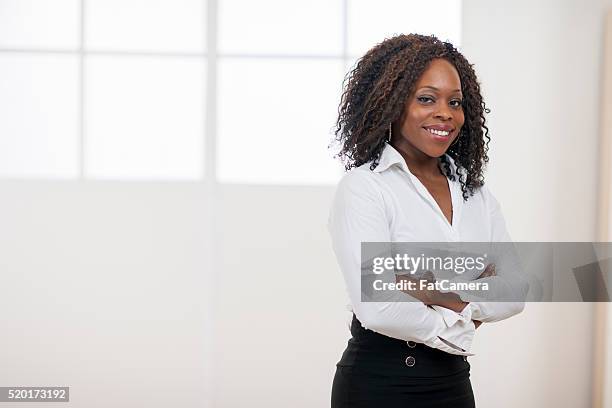 female ceo - black blouse stock pictures, royalty-free photos & images