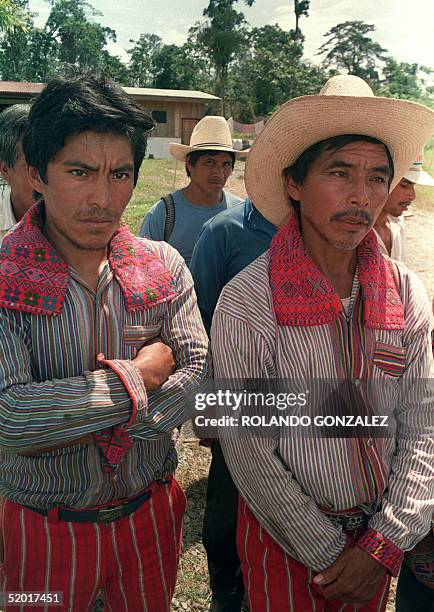 Representants of a group of peasants repatriated from Mexico ask National Guatemalan Revolutionary Unit commanders to control their troops and...