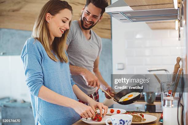 cooking together - couple breakfast bildbanksfoton och bilder