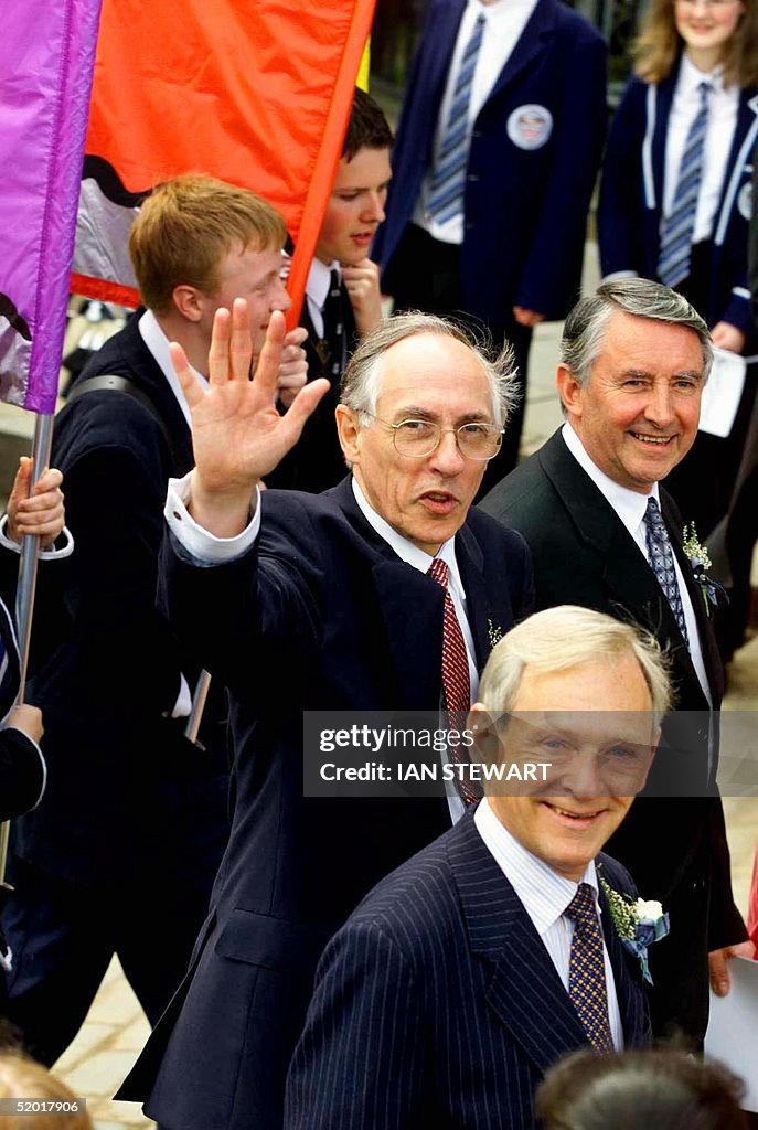 The Scottish First Minister, Donald Dewar, waves a