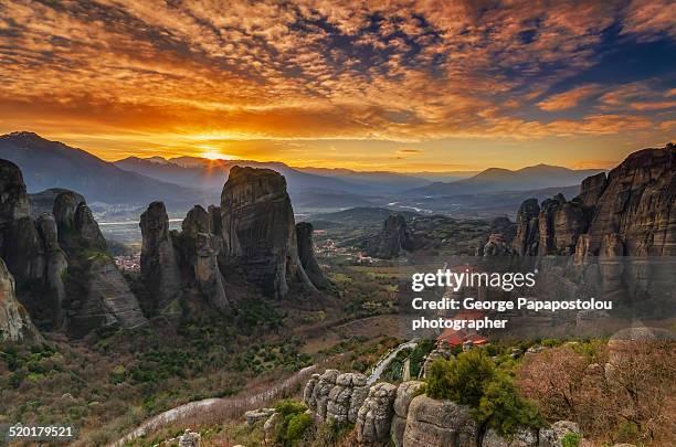 meteora holy sunset - meteora greece stock pictures, royalty-free photos & images