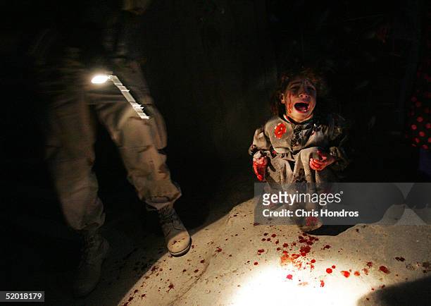 Samar Hassan screams after her parents were killed by U.S. Soldiers with the 25th Infantry Division in a shooting January 18, 2005 in Tal Afar, Iraq....