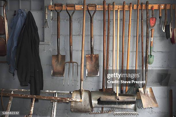 tools on wall in garage - pitchfork agricultural equipment bildbanksfoton och bilder