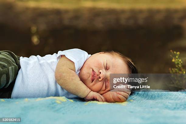 sleeping baby girl - rock baby sleep stock pictures, royalty-free photos & images