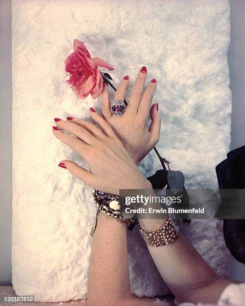 The hand of Lady Charles Cavendish, nee Adele Astaire, wearing jewelry from Van Cleef and Arpels.