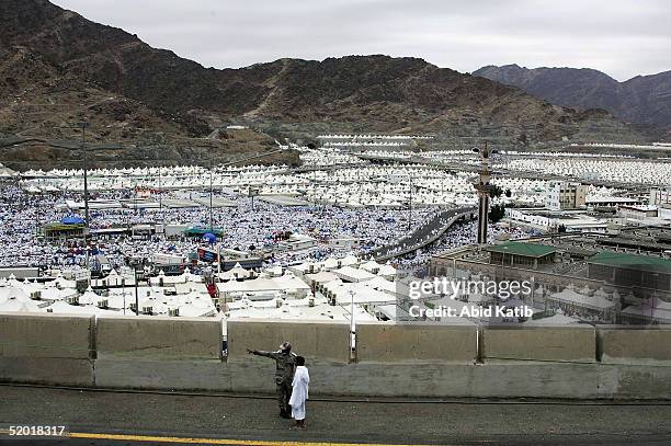 Muslim man is pointed in the right direction during the hajj pilgrimage in Mina, 3 kilometres southeast of Mecca, 18 January 2004 in Saudi Arabia....