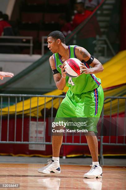 Kendall Dartez of the Florida Flame looks to play the ball against the Huntsville Flight during an NBDL game on December 11, 2004 at the Von Braun...