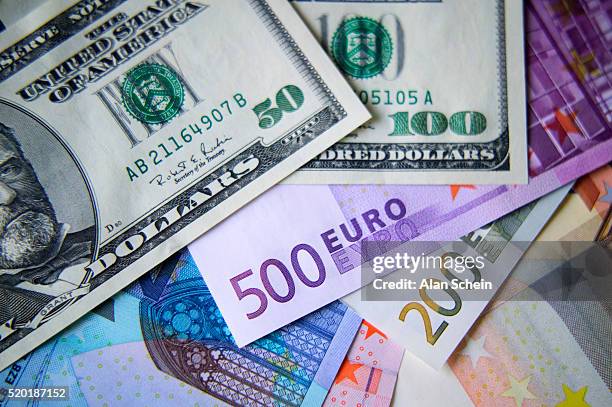 euro and dollar notes - european union currency stock pictures, royalty-free photos & images