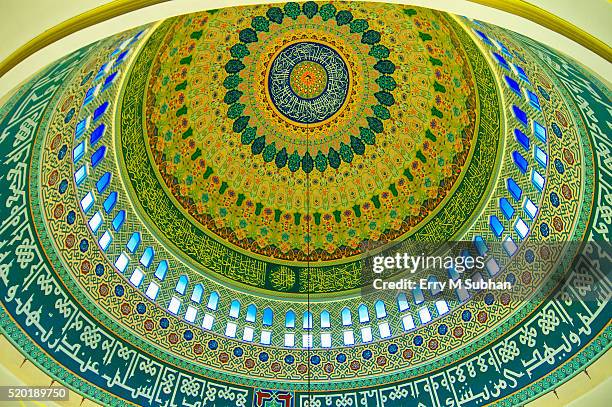 arabian calligraphy writing on the roof - islam ornament stock pictures, royalty-free photos & images