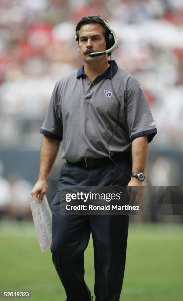 Head coach Jeff Fisher of the Tennessee Titans walks the sidelines during the game against the Houston Texans on November 28, 2004 at Reliant Stadium...