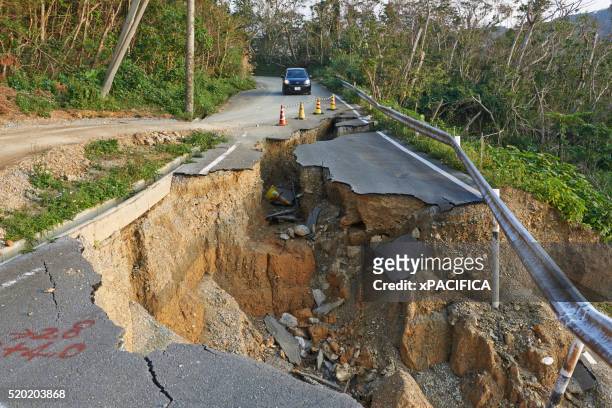 landslide damage caused by typhoons in okinawa - erdrutsch stock-fotos und bilder