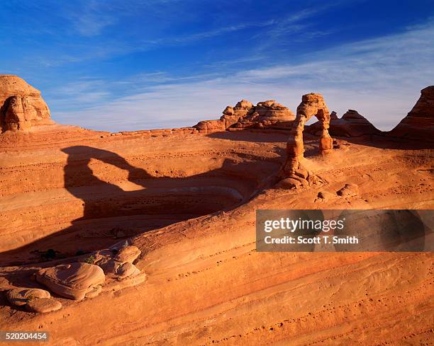 delicate arch and its shadow in arches national park - delicate arch stock-fotos und bilder