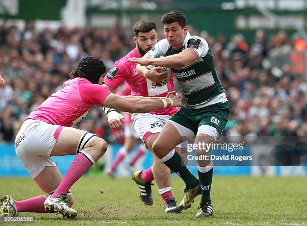 Ben Youngs of Leicester is tackled during the European Rugby Champions Cup quarter final match between Leicester Tigers and Stade Francais at Welford...