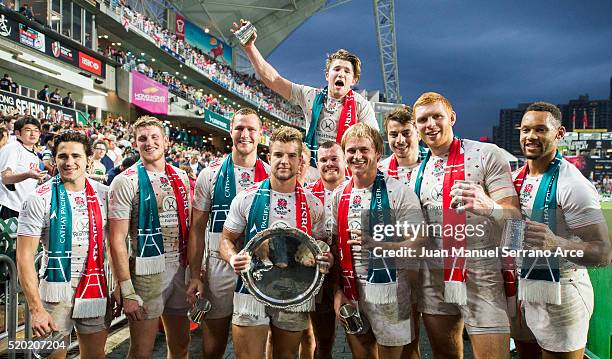 England players celebrate with the trophy after winning the Plate final during the 2016 Hong Kong Sevens at Hong Kong Stadium on April 10, 2016 in...