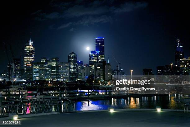 full moon over melbourne - docklands melbourne stock-fotos und bilder