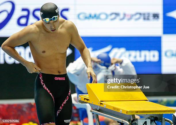 Takuro Fujii prepares to compete in the men's 100m butterfly final at the Japan Swim 2016 at Tokyo Tatsumi International Swimming Pool on April 10,...