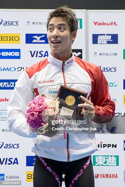 Takuro Fujii wins first place after the men's 100m butterfly final during the Japan Swim 2016 at Tokyo Tatsumi International Swimming Pool on April...