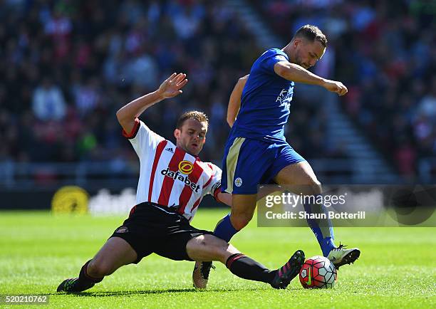 Danny Drinkwater of Leicester City evades Lee Cattermole of Sunderland during the Barclays Premier League match between Sunderland and Leicester City...