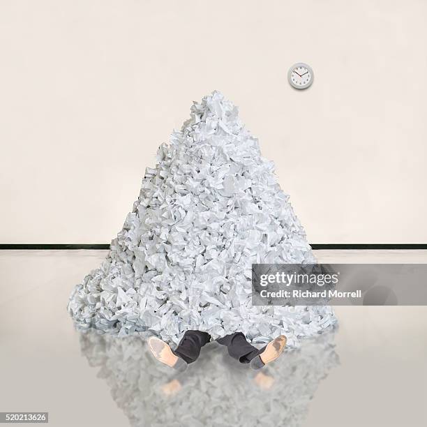 businessman buried beneath pile of paper - buried paperwork stock pictures, royalty-free photos & images