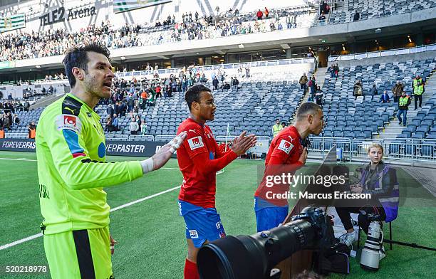 Matt Pyzdrowski, goalkeeper, Matthew Rusike and Jordan Larsson of Helsingborgs IF talks with the supporters after the Allsvenskan match between...