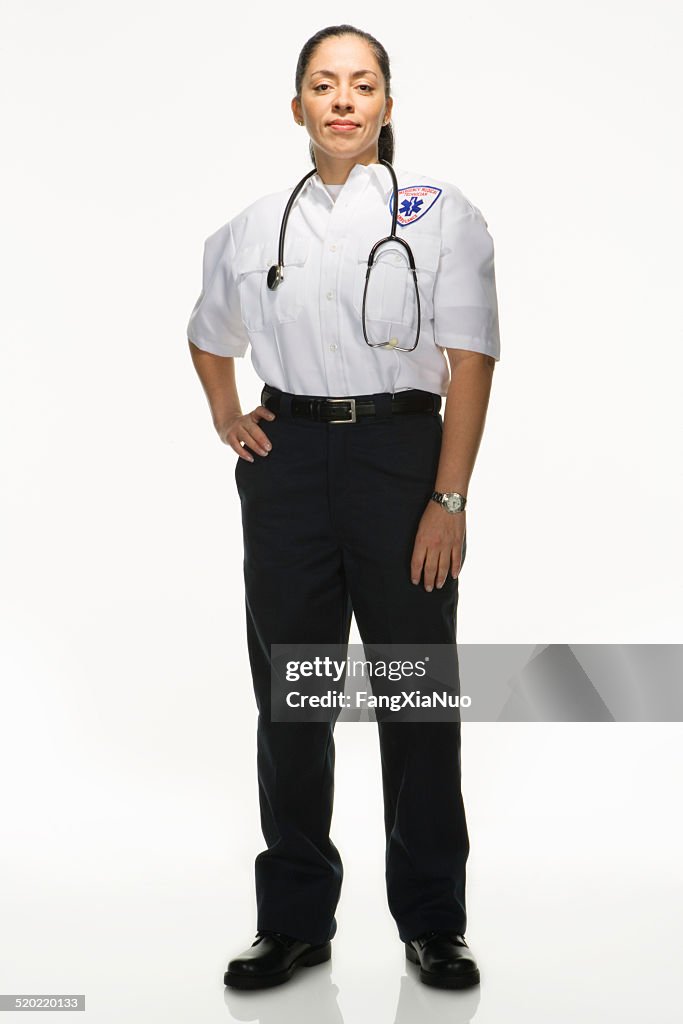 Female Paramedic on white background, portrait