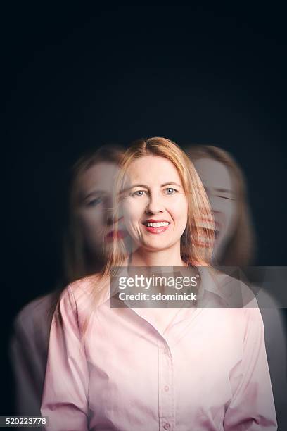 frau mit emotionen konzept probleme - lady face black background happy stock-fotos und bilder
