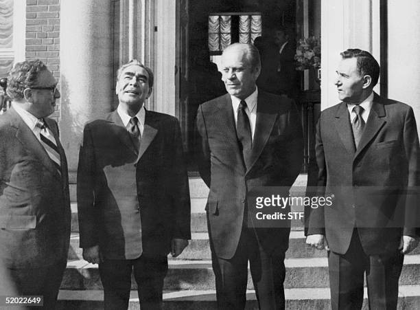 Soviet leader and general secretary of the Communist Party Leonid Brezhnev poses at the US embassy with American president Gerald Ford during their...