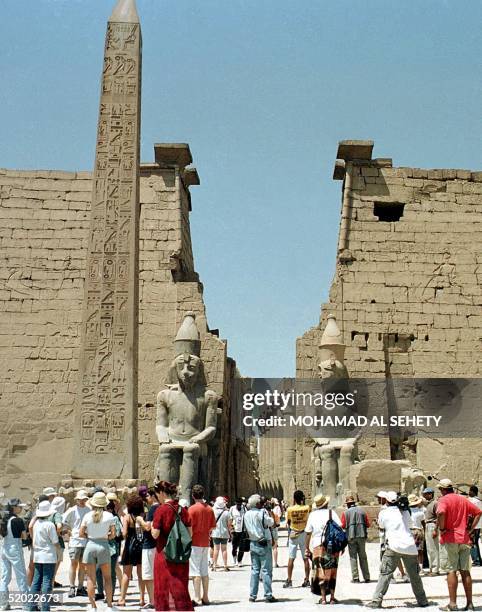 Tourists gather in Luxor 19 August 1999. Tourism has made a comeback since the November 1997 massacre of 58 foreign tourists in Luxor, but the...