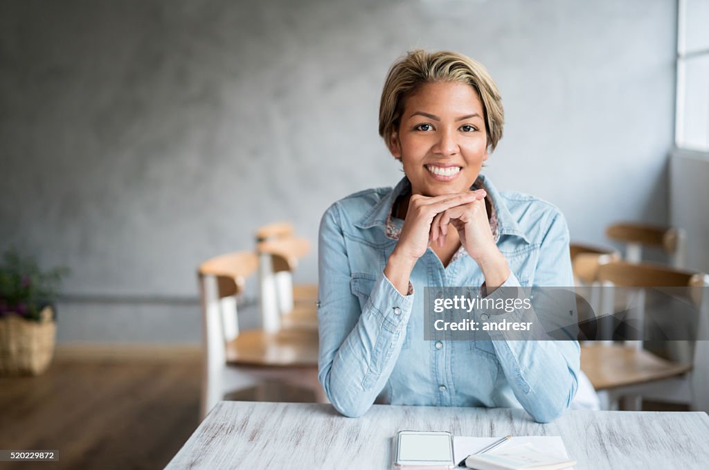 Business owner doing the books at a restaurant