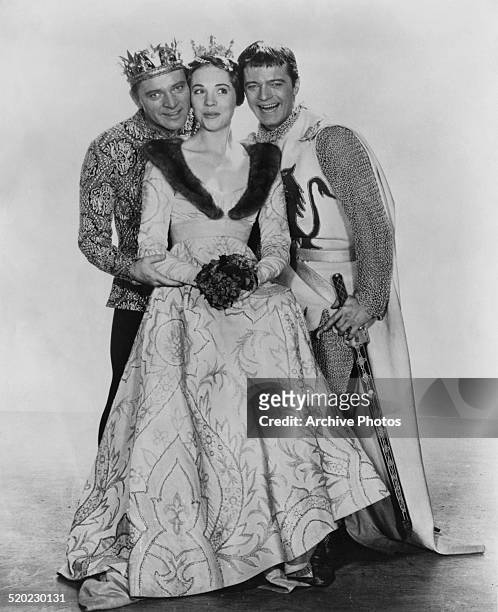Welsh stage and cinema actor Richard Burton , English film and stage actress Julie Andrews, and American singer and actor Robert Goulet in costume...