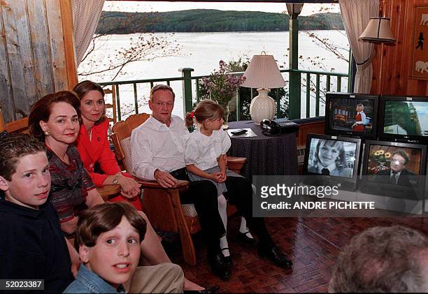 Family members of Canadian Prime Minister Jean Chretien are gathered at the Prime Minister's home of Shawanigan, Quebec, 02 June, to follow Canadian...