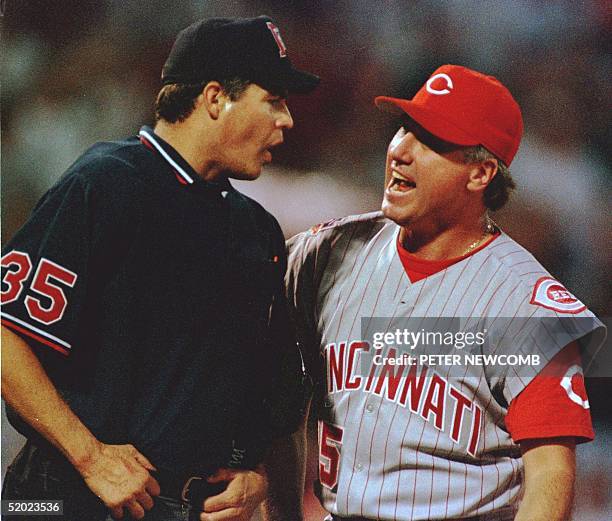 Home plate umpire Gary Darling argues with Cincinnati Reds Manager Ray Knight over a call at home plate in the sixth inning of their game in St....