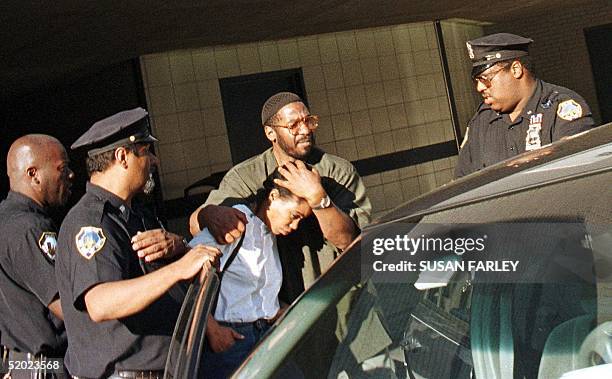 Qubilah Bahiyah Shabazz, daughter of Betty Shabazz, is helped to a waiting car 23 June outside Jacobi Hospital in the Bronx, New York. Betty Shabazz,...