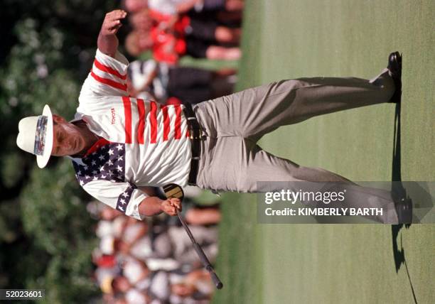 Golfer Chi Chi Rodriguez does his sword routine after putting a birdie on the 9th green, 27 June, during the second day of the U.S. Senior Open golf...