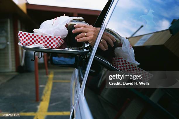 food at a&w drive-in - drinking soda in car stock pictures, royalty-free photos & images