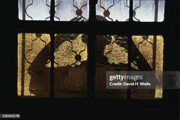 figure at window at abdel-hadi palace - palestinian boy stock pictures, royalty-free photos & images